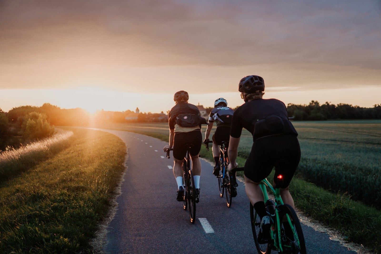 Weekend cycling club ride at sunrise